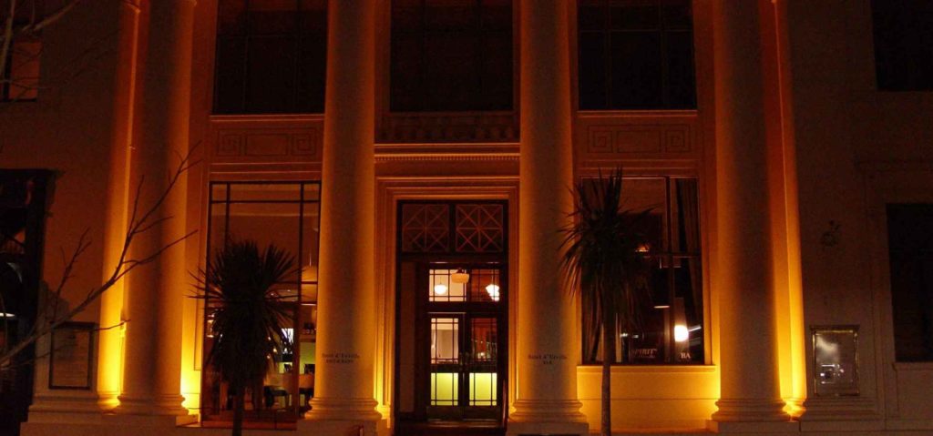 Hotel d'Urville building - facade columns lit up at night